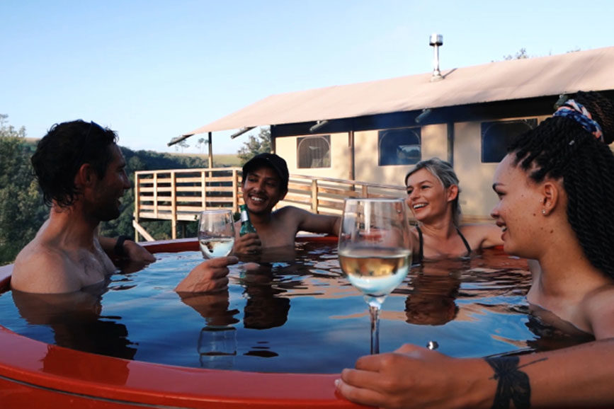 africamps-at-ingwe-054-(2) friends-in-hot-tub-at-africamps-at-ingwe-in-plettenberg-bay-garden-route