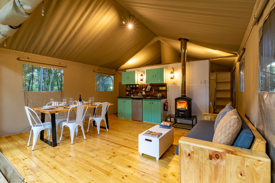 dining-and-lounge-area-in-boutique-glamping-tent-at-africamps-kambati-swellendam