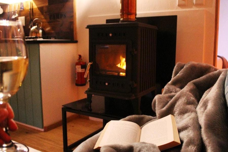 indoor-fireplace-in-glamping-tent-at-africamps-at-kambati-swellendam